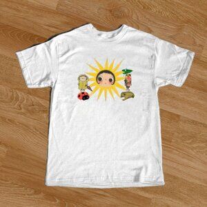 White graphic tee with cute cartoon characters